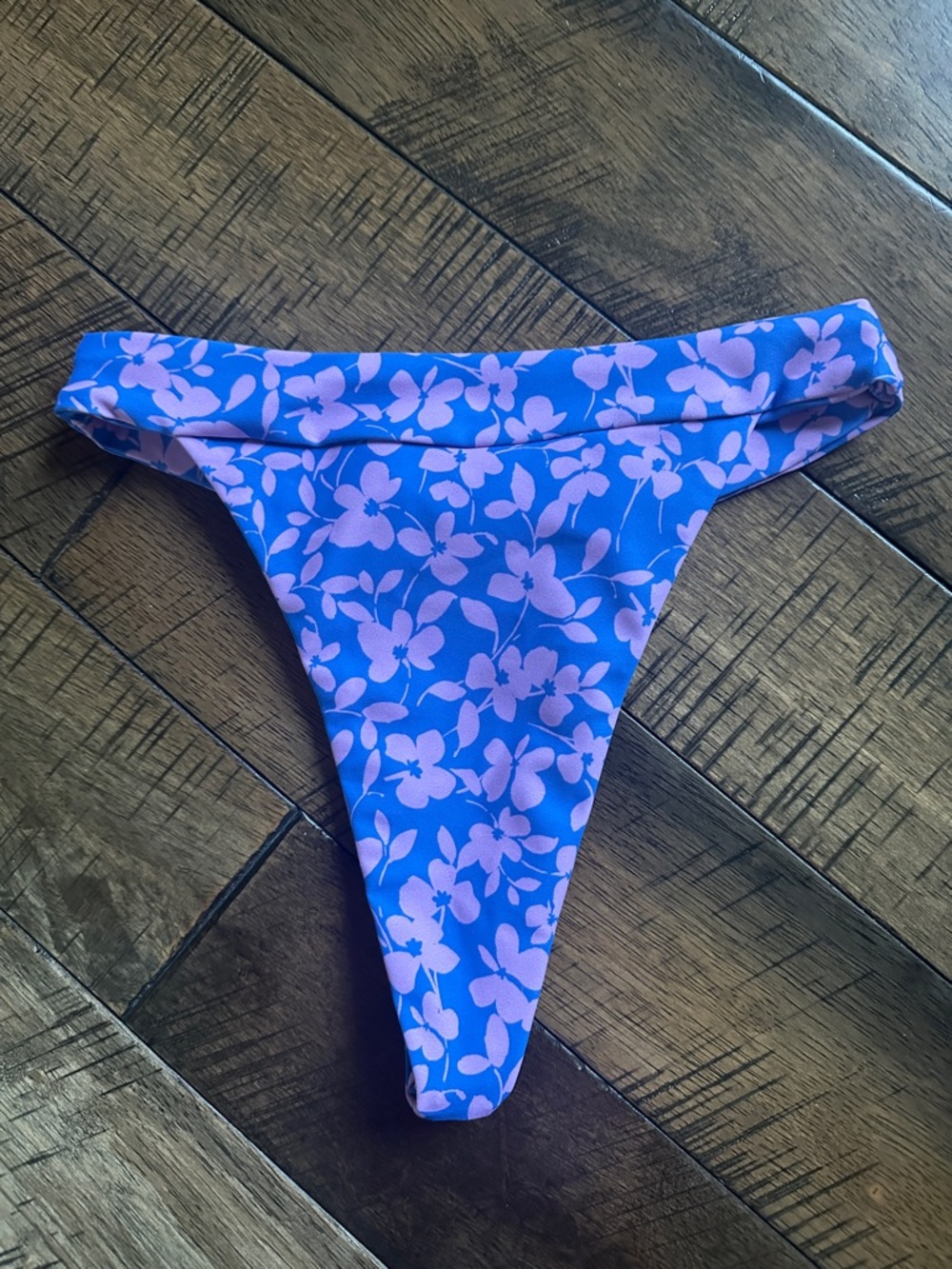 Skatie Summer is the name of the cut purple Floral Bikini Bottom